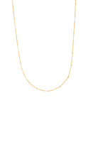 Gold chain necklace on a white background