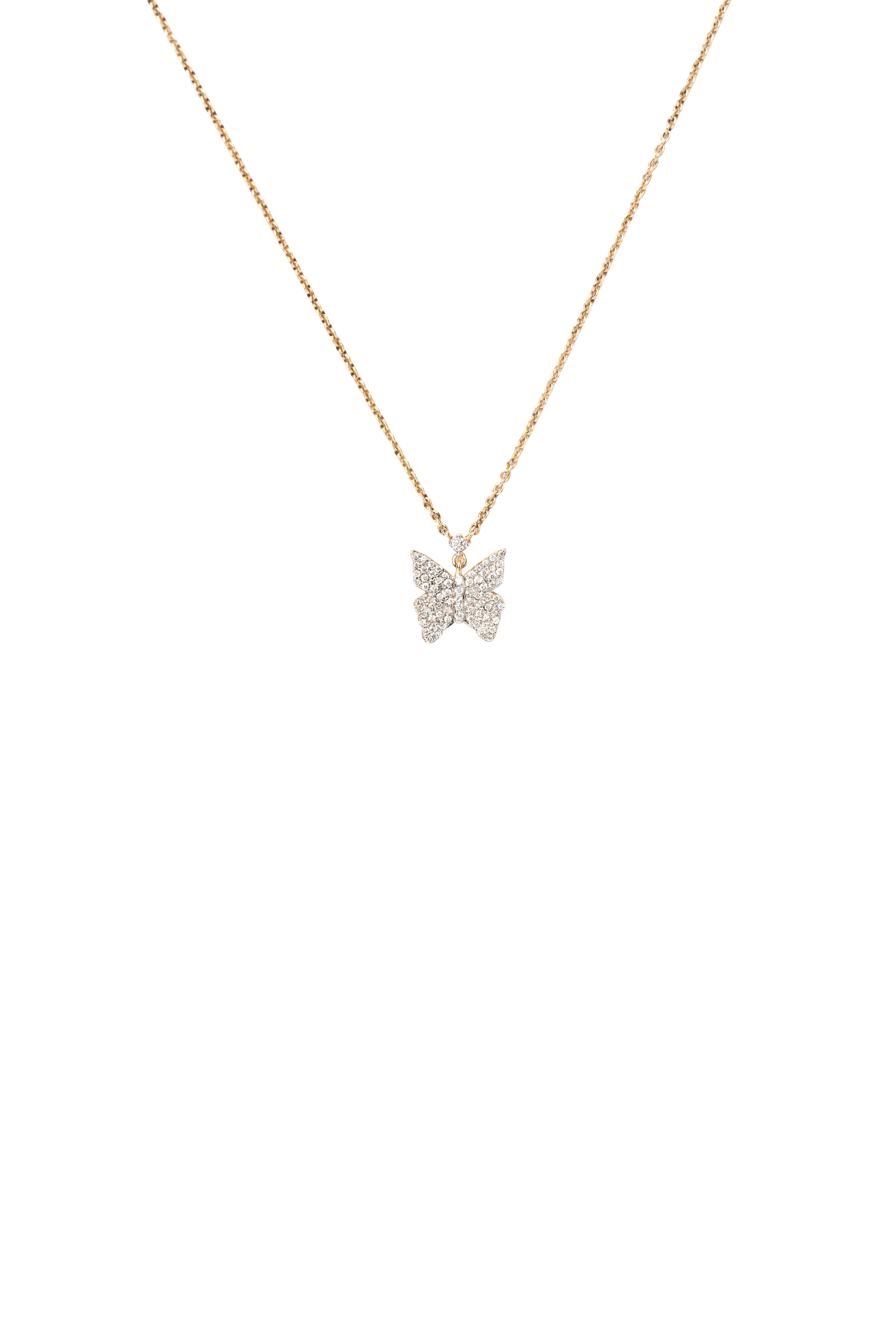 Gold necklace with a butterfly pendant on a white background