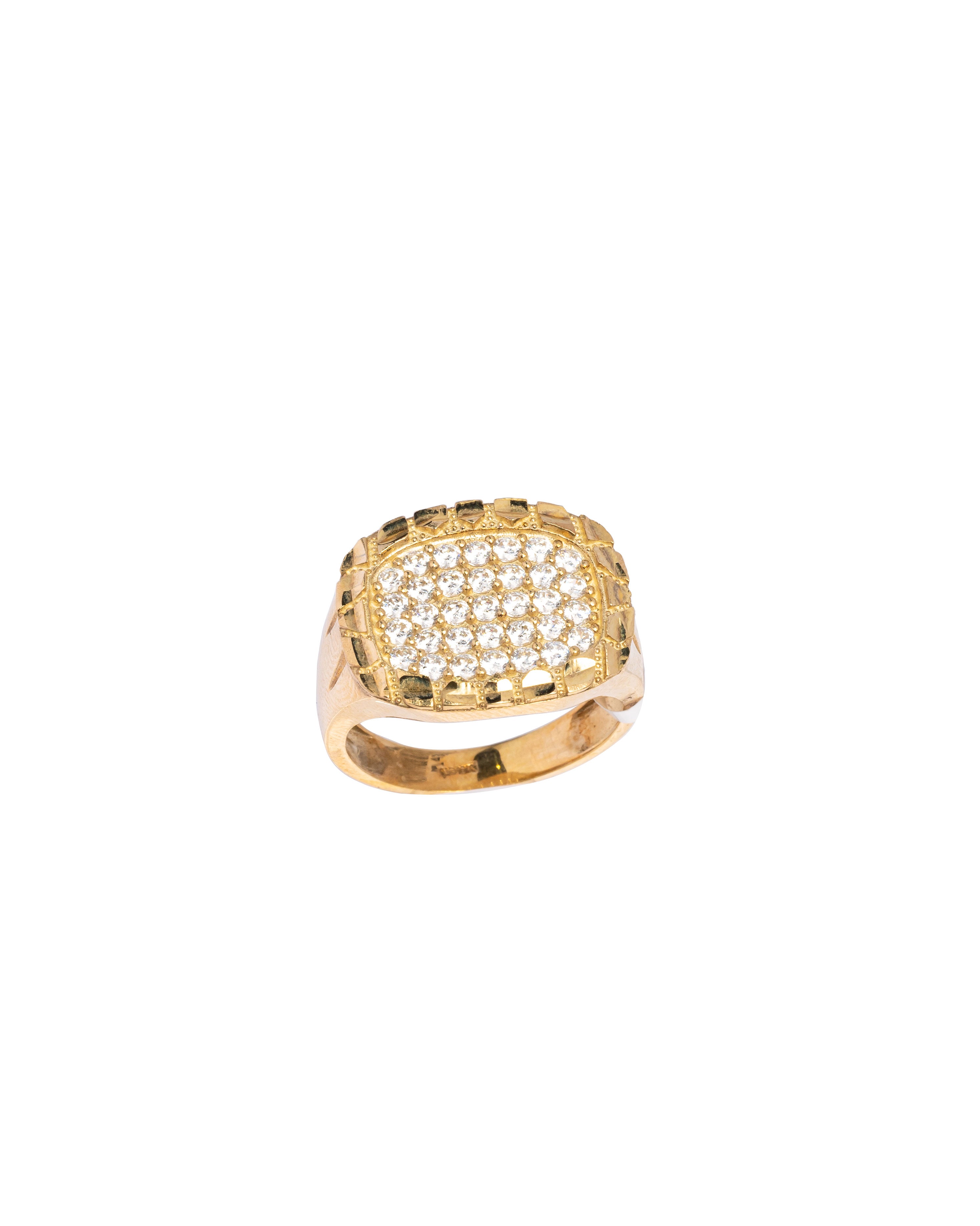 Gold ring with a textured design on a white background