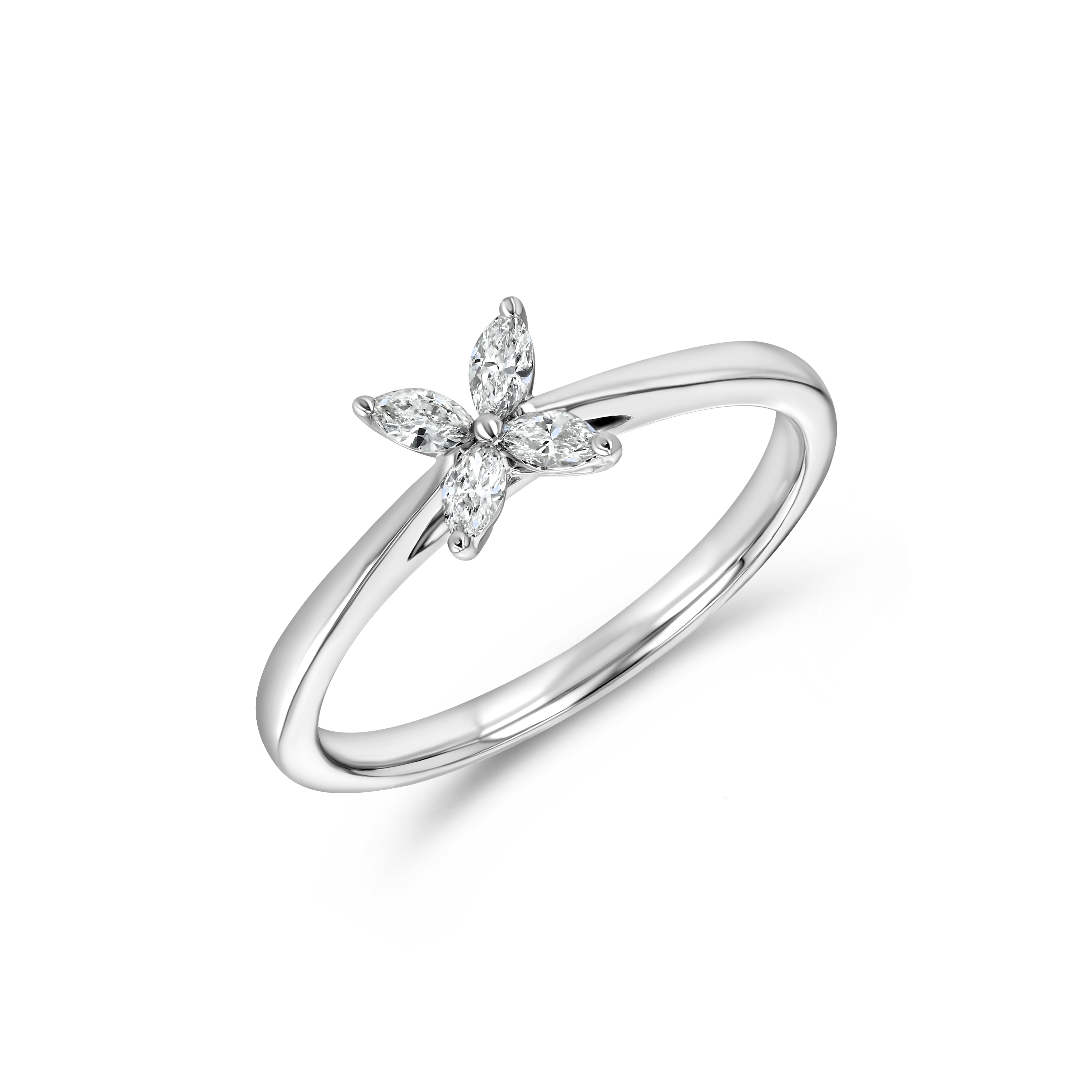 A 10k white gold ring with a flower-shaped design containing a lab diamond at the center, placed on a plain background.