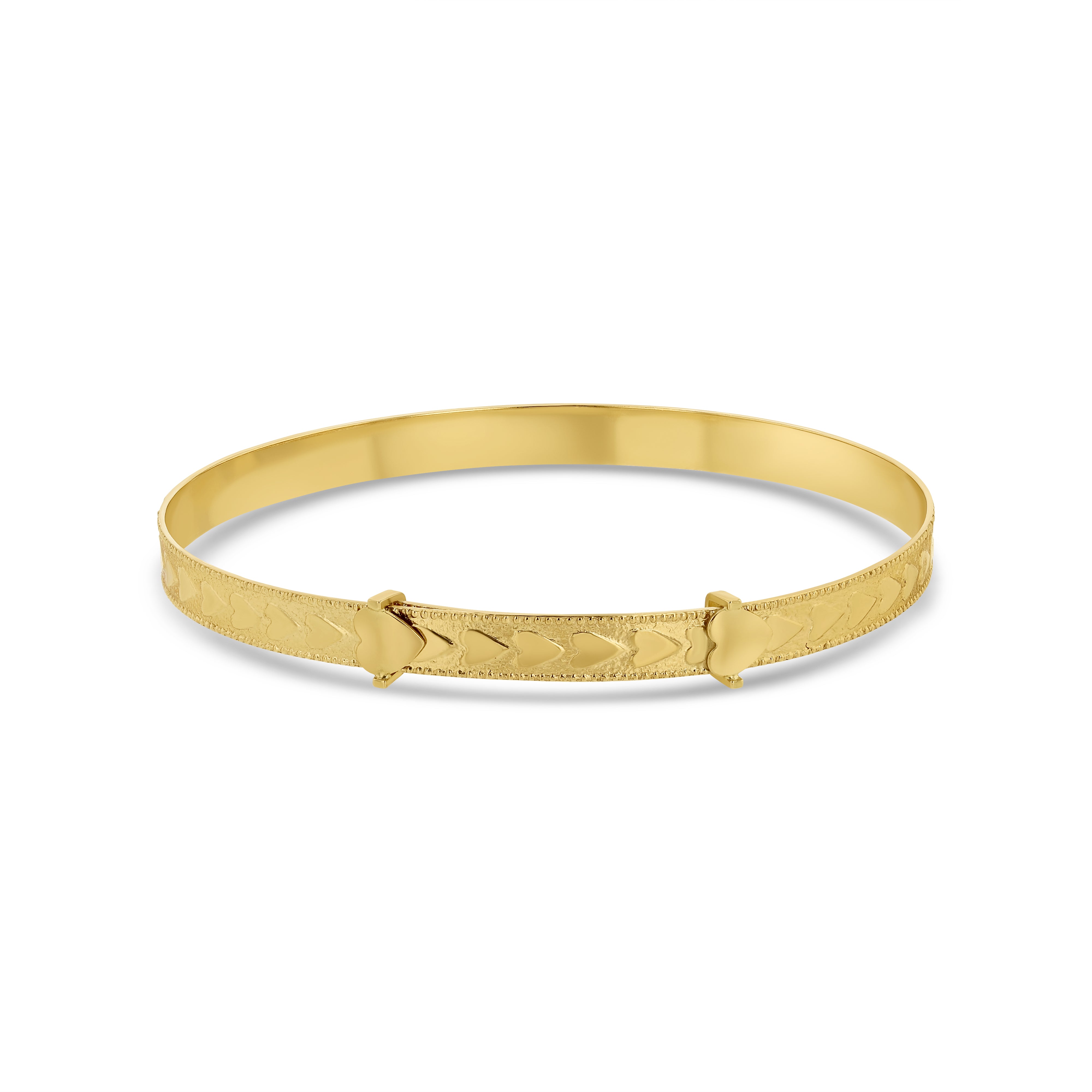 A 14k yellow gold baby bangle bracelet with a heart design.