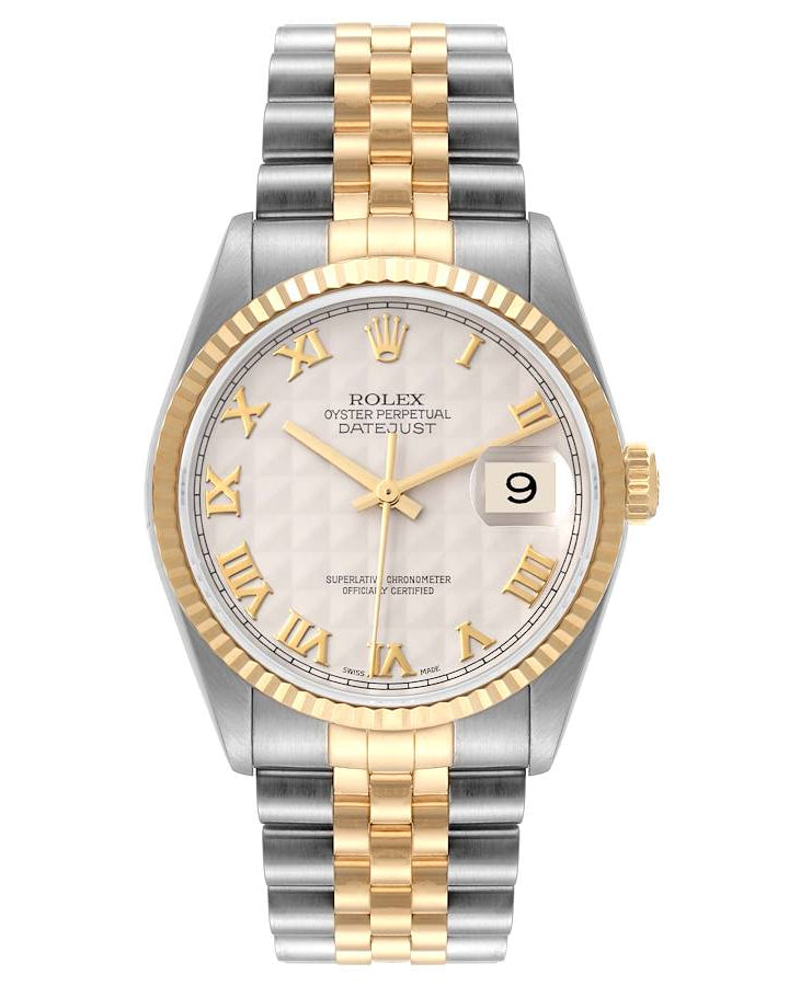 Two-tone watch with silver and gold band on a white background