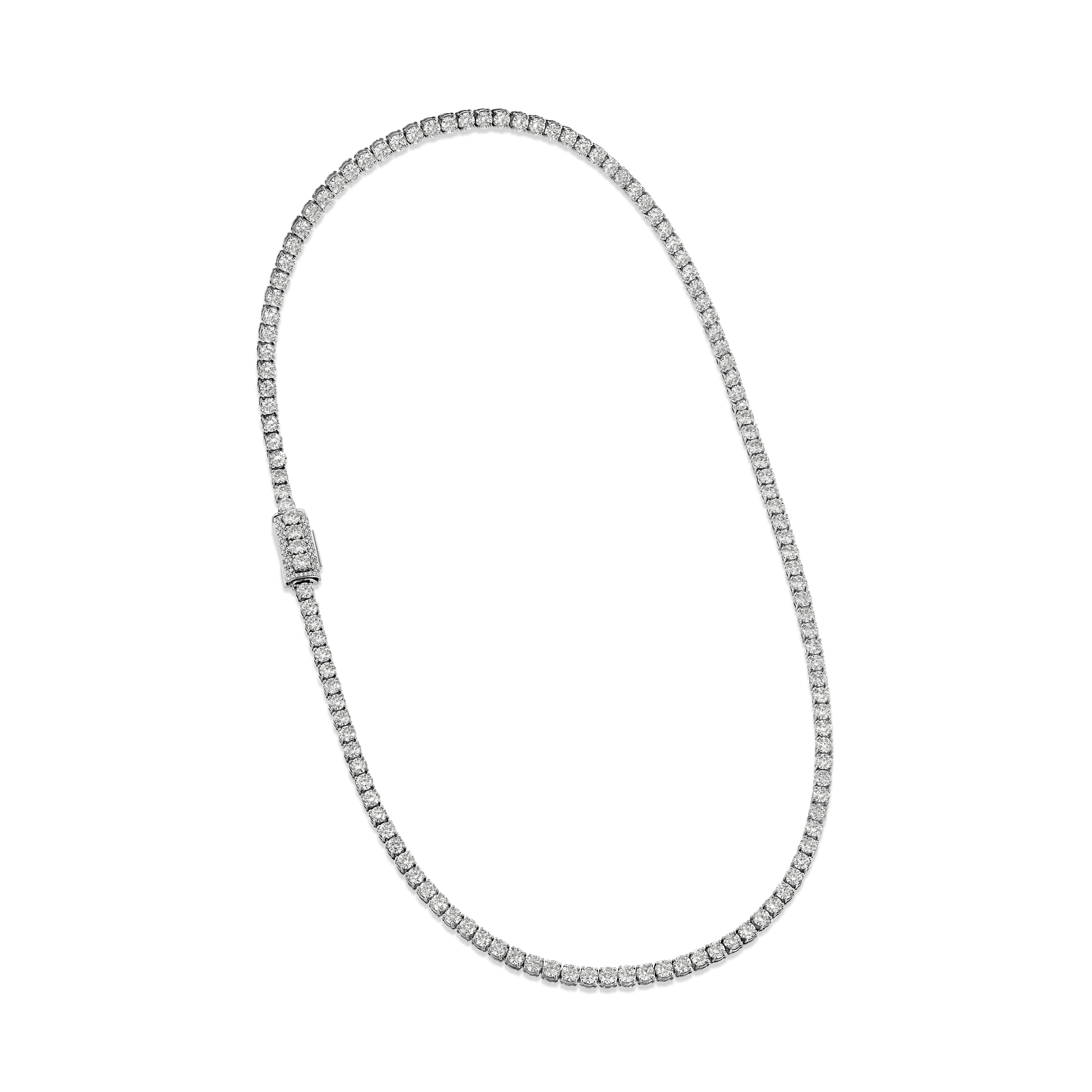 A sterling silver or gold-filled tennis chain necklace with moissanite diamond accents.