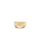 Gold ring with a dollar bill design on a white background