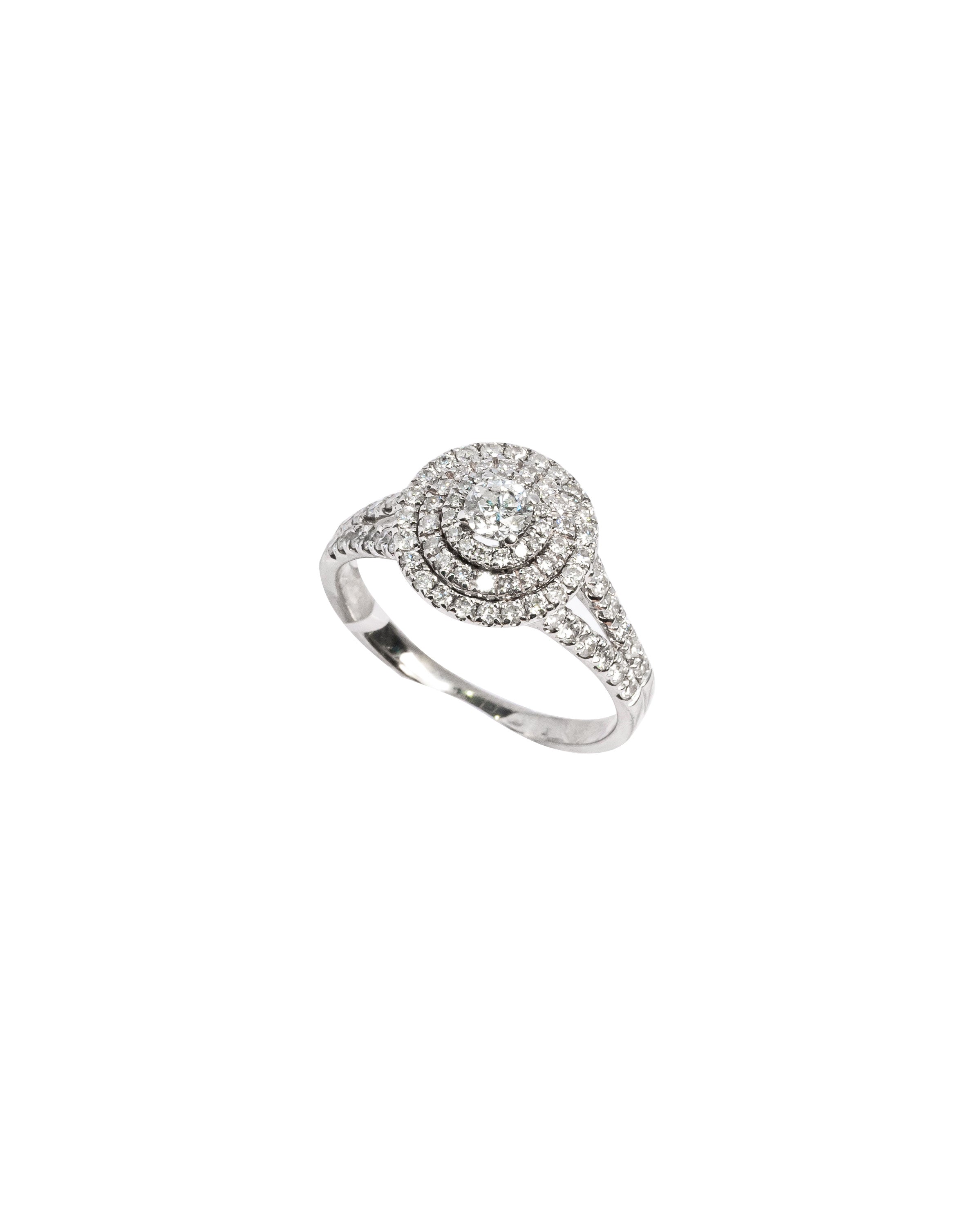 Silver ring with gemstones on a white background
