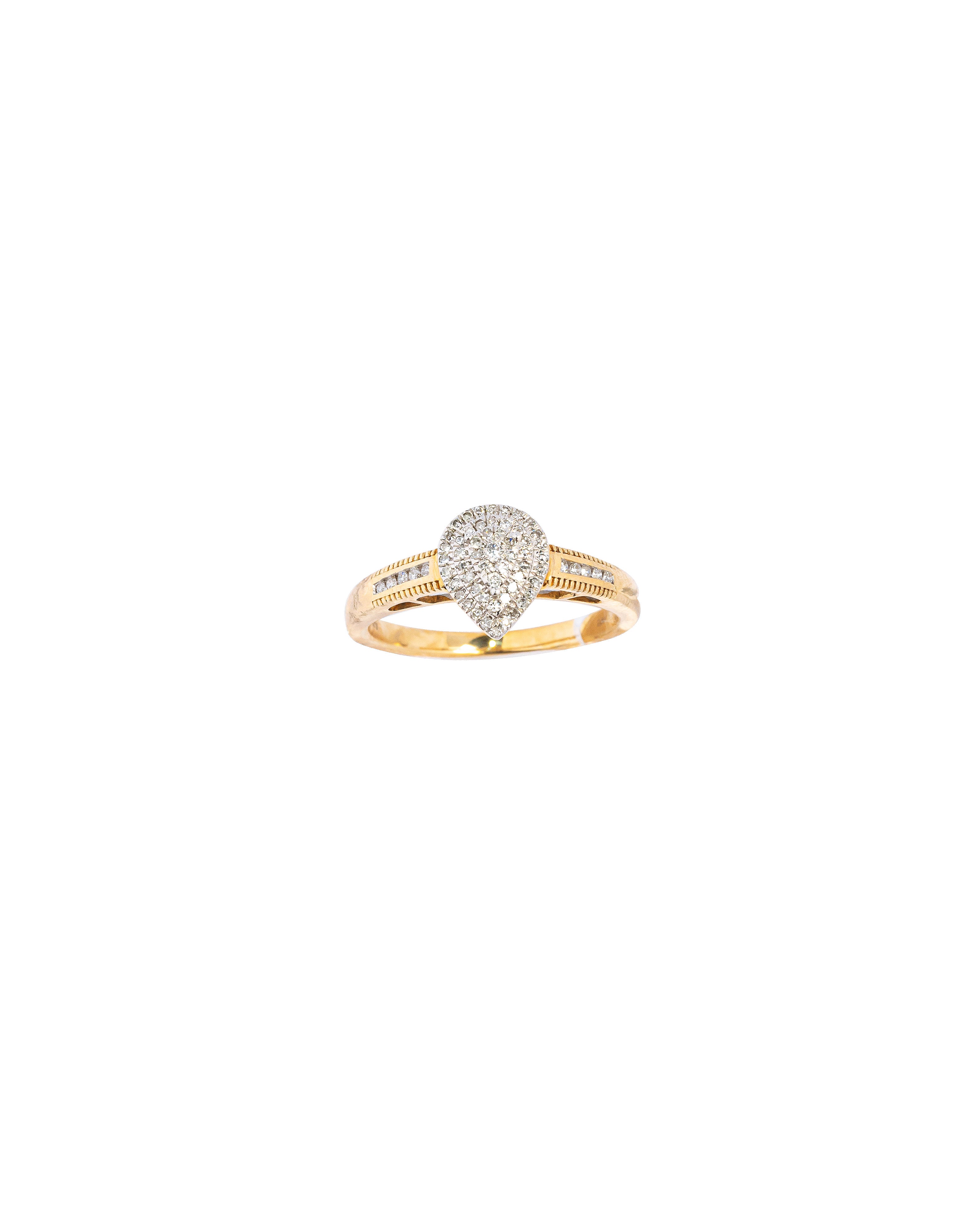 Gold ring with a diamond on a white background