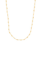Gold necklace on a white background