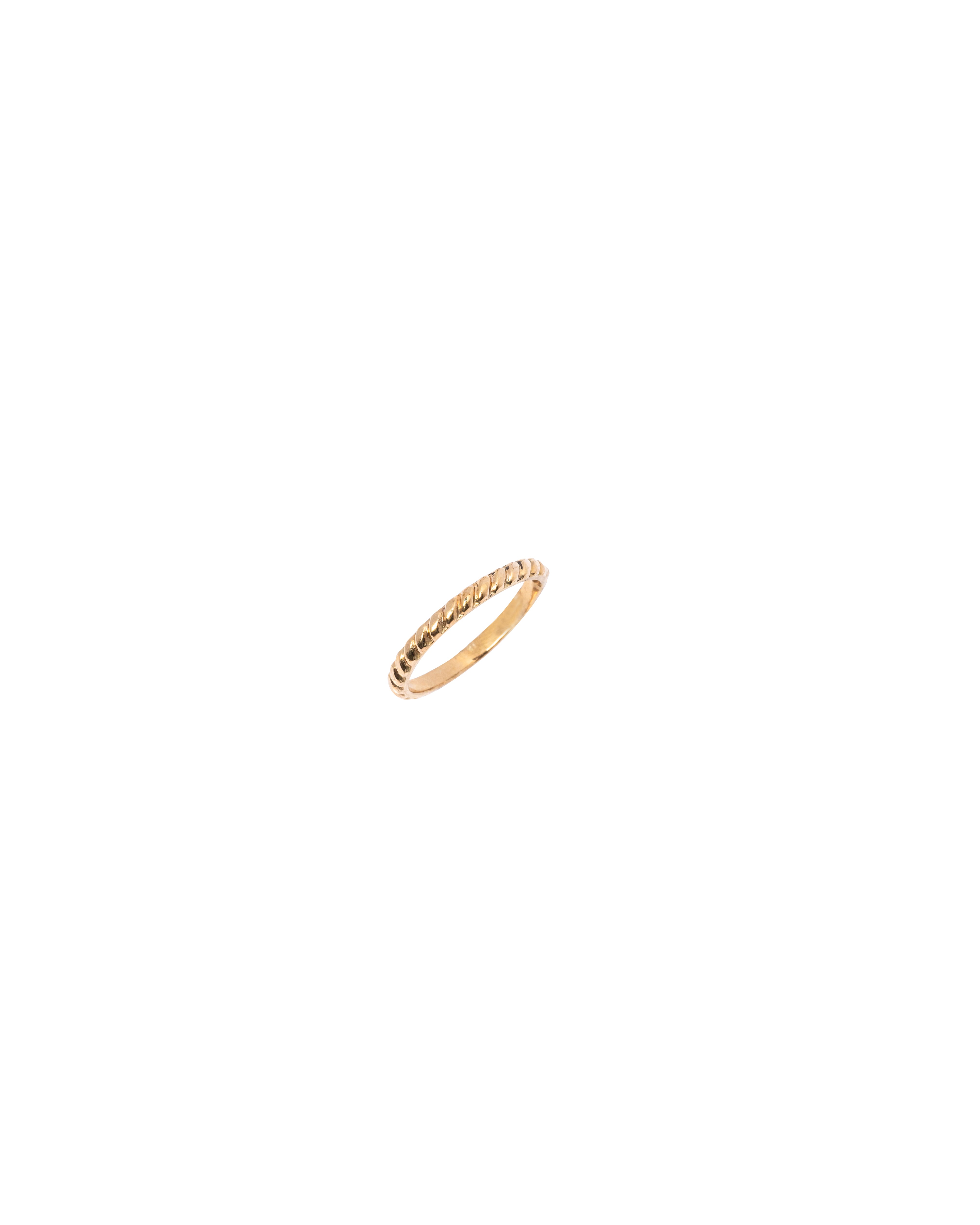 Gold ring on a white background