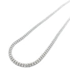 A 10K white gold hollow ice chain necklace with a lobster clasp, laid out on a white background.