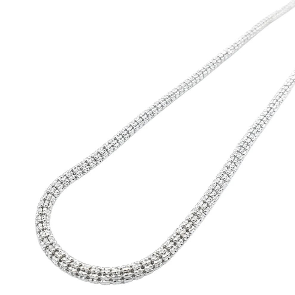 A 10K white gold hollow ice chain necklace with a lobster clasp, laid out on a white background.