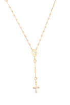 Gold necklace with a cross pendant on a white background