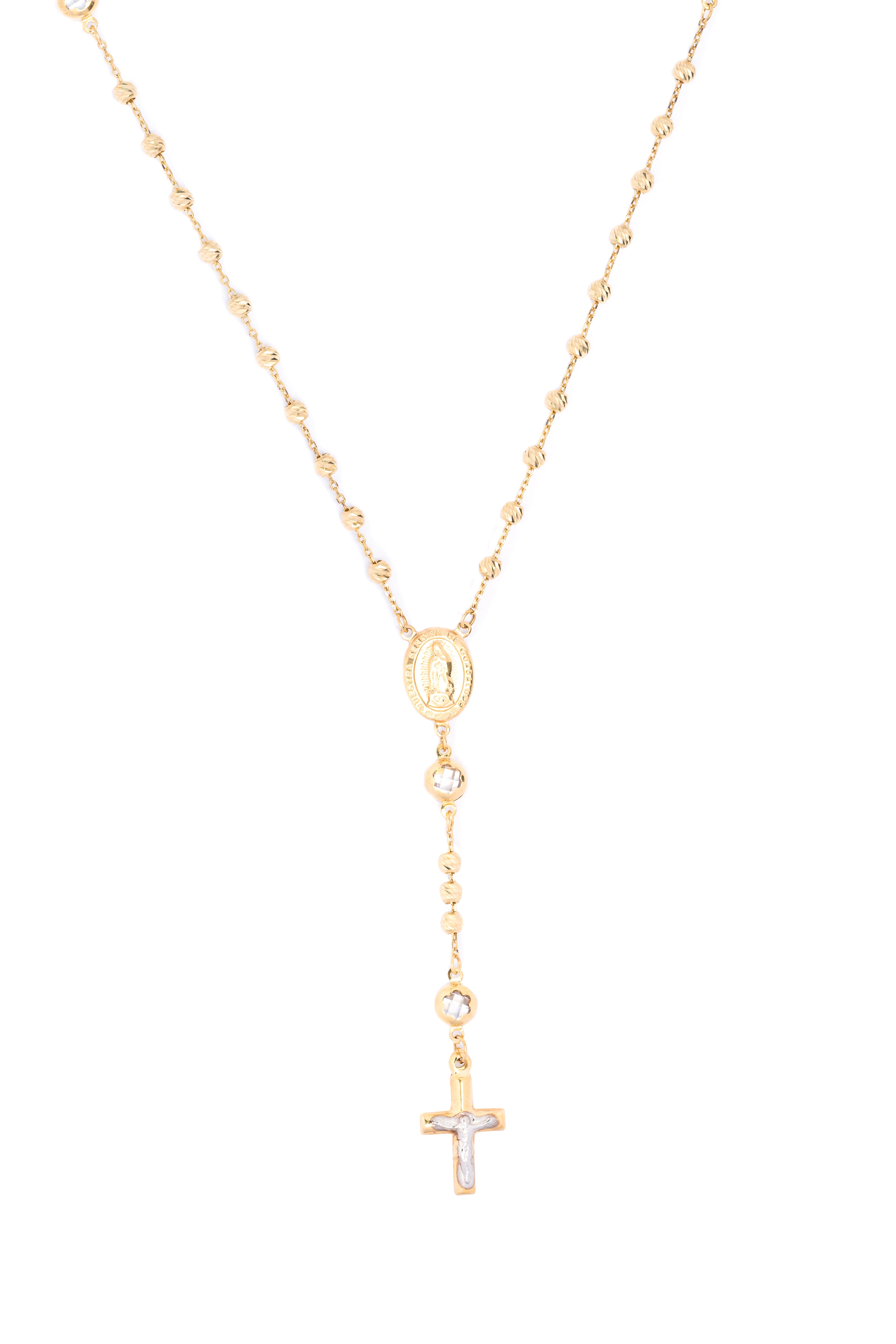 Gold necklace with a cross pendant on a white background