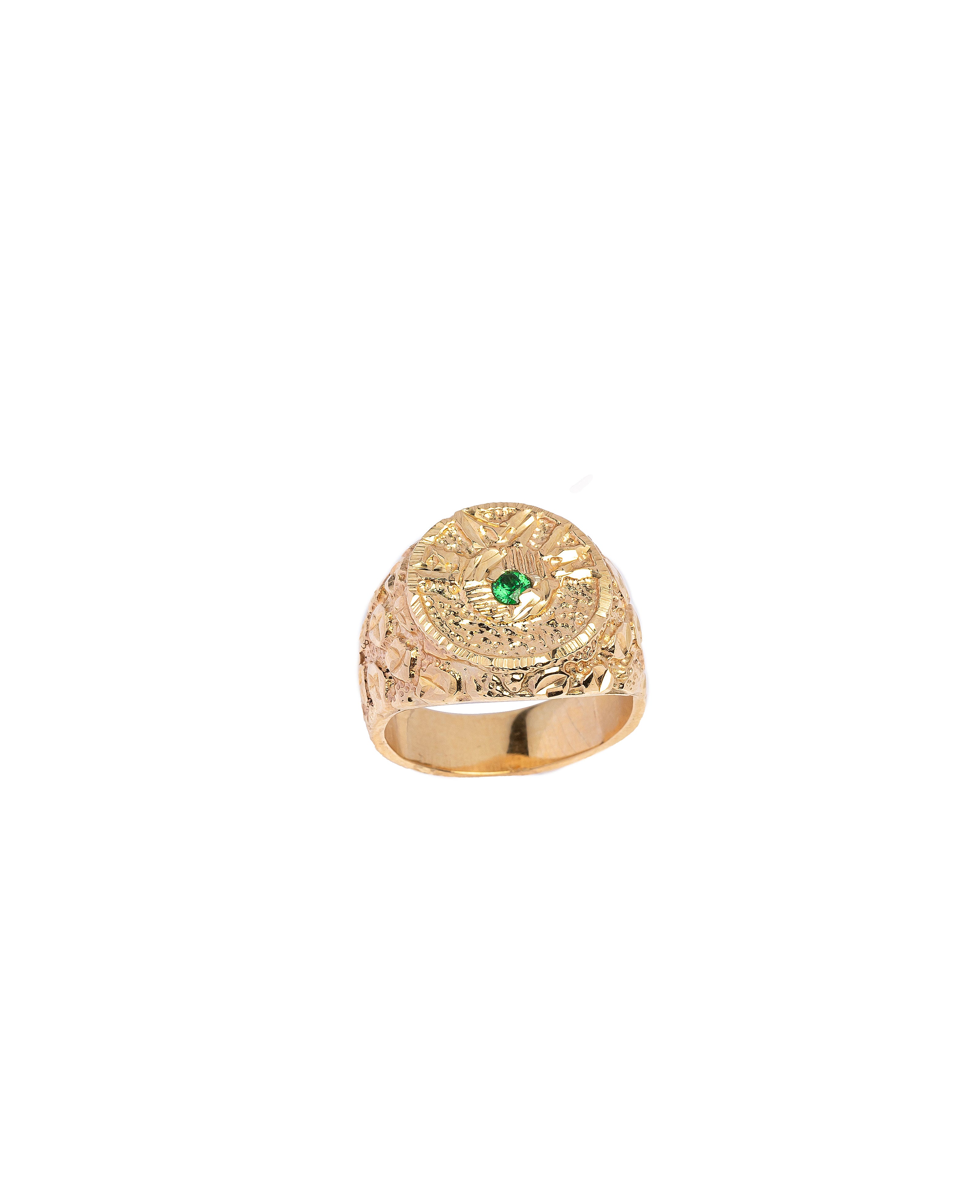Gold ring with a green gemstone on a white background