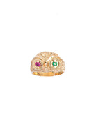 Gold ring with gemstones on a white background