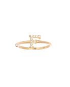 Gold ring with a letter 'H' design on a white background