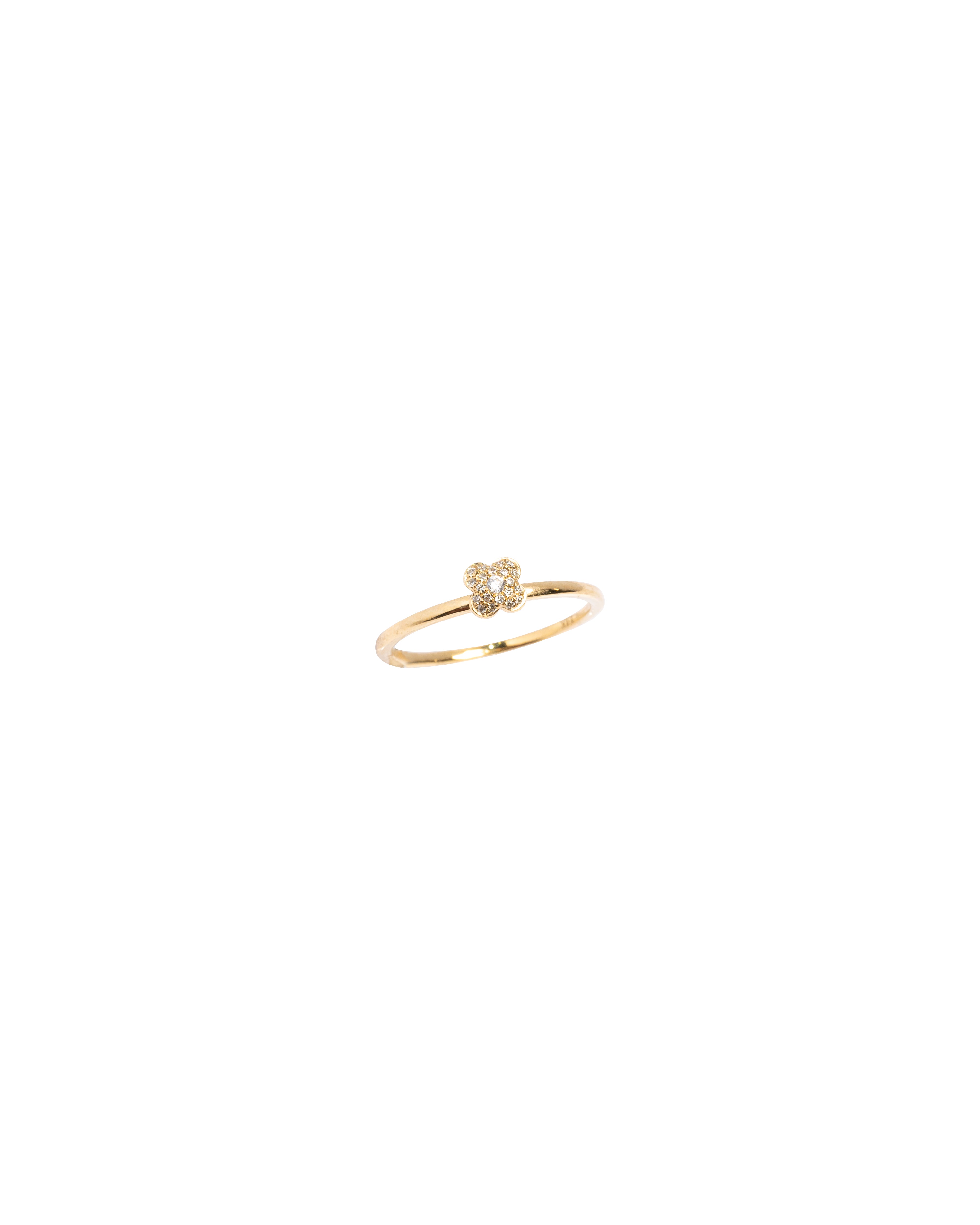 Gold ring with a small diamond on a white background