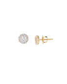 Gold stud earrings with clear gemstones on a white background