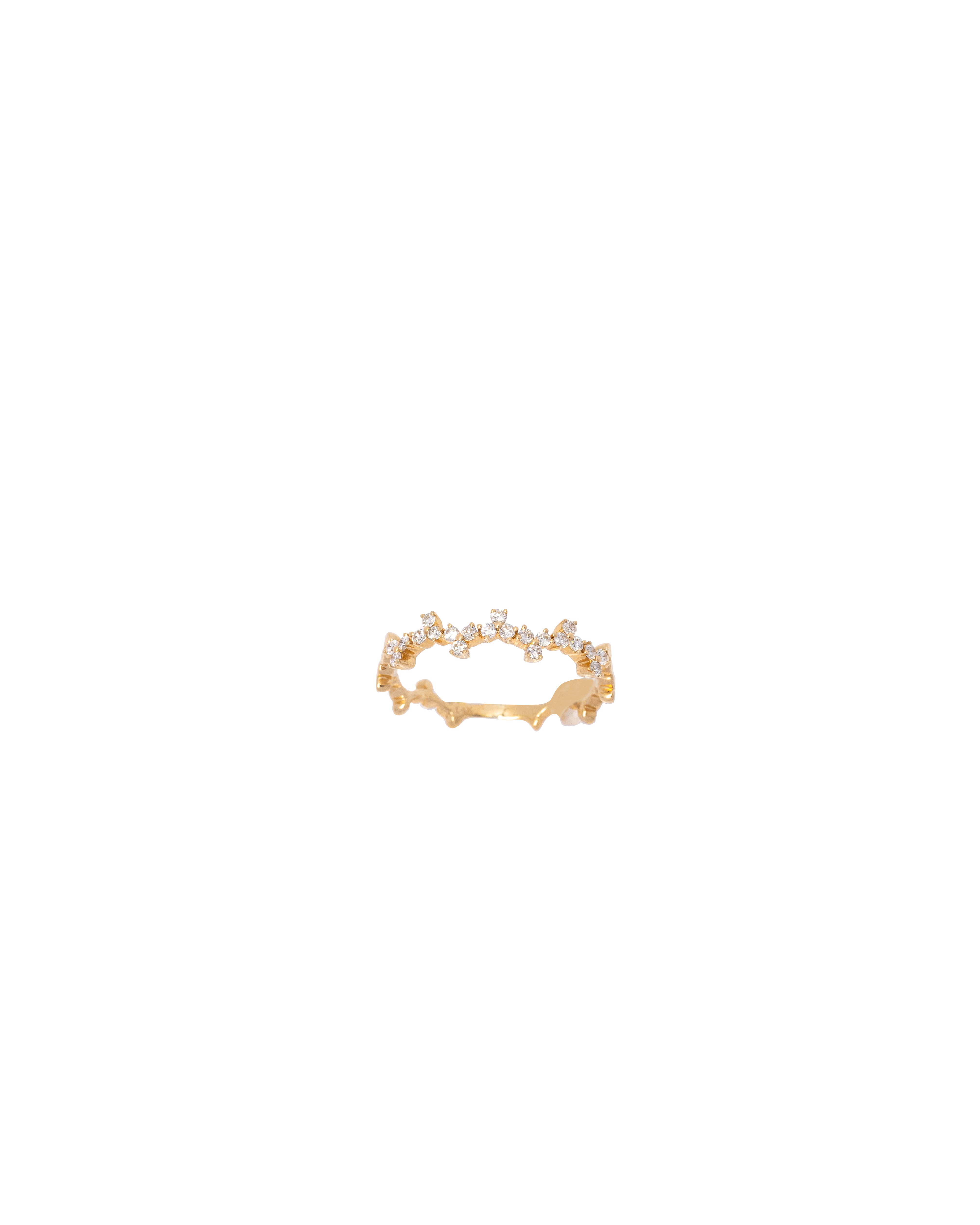 Gold ring with small stones on a white background