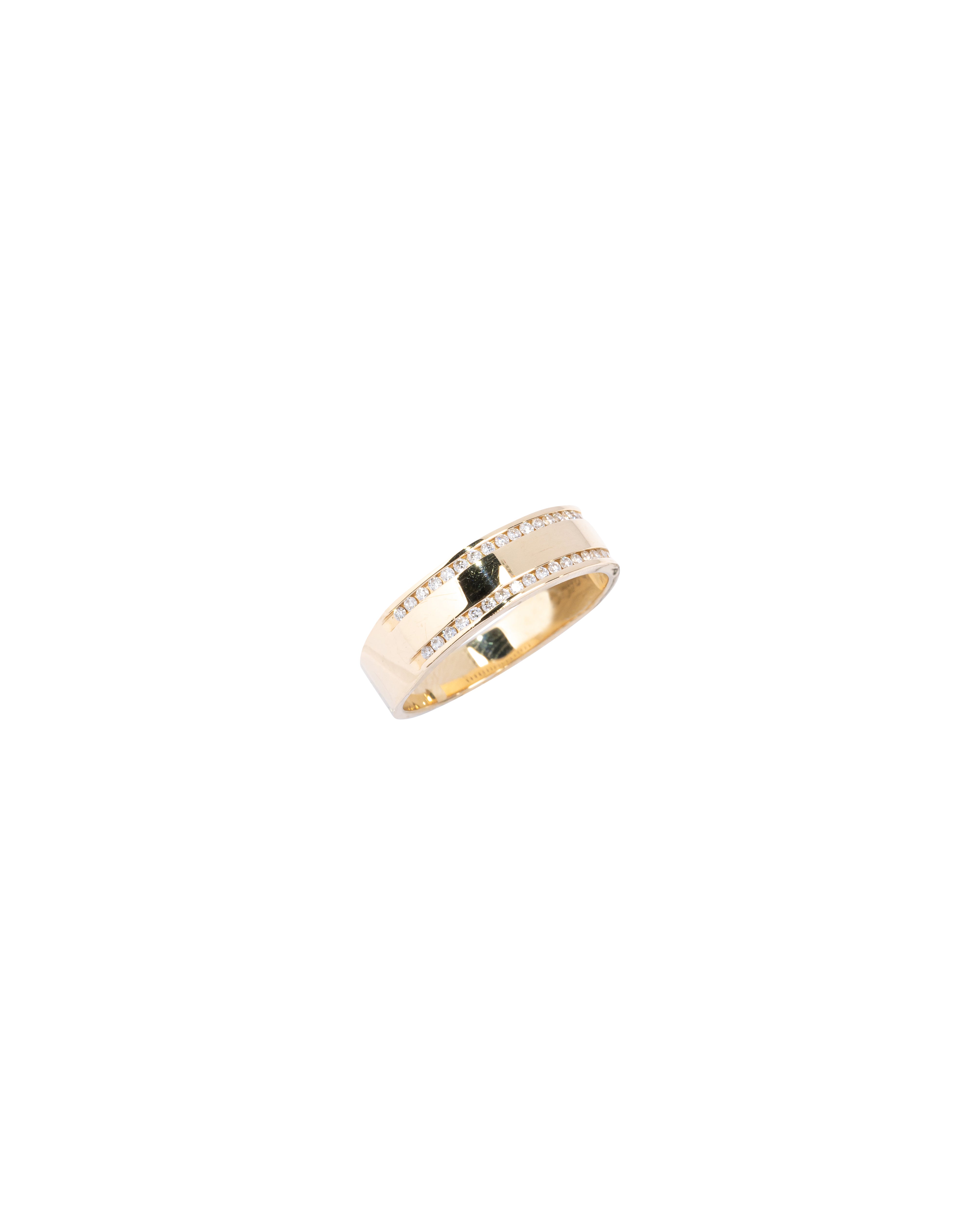 Gold ring with black stones on a white background