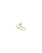 Gold ring with star design on a white background