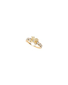 Gold ring with diamonds on a white background