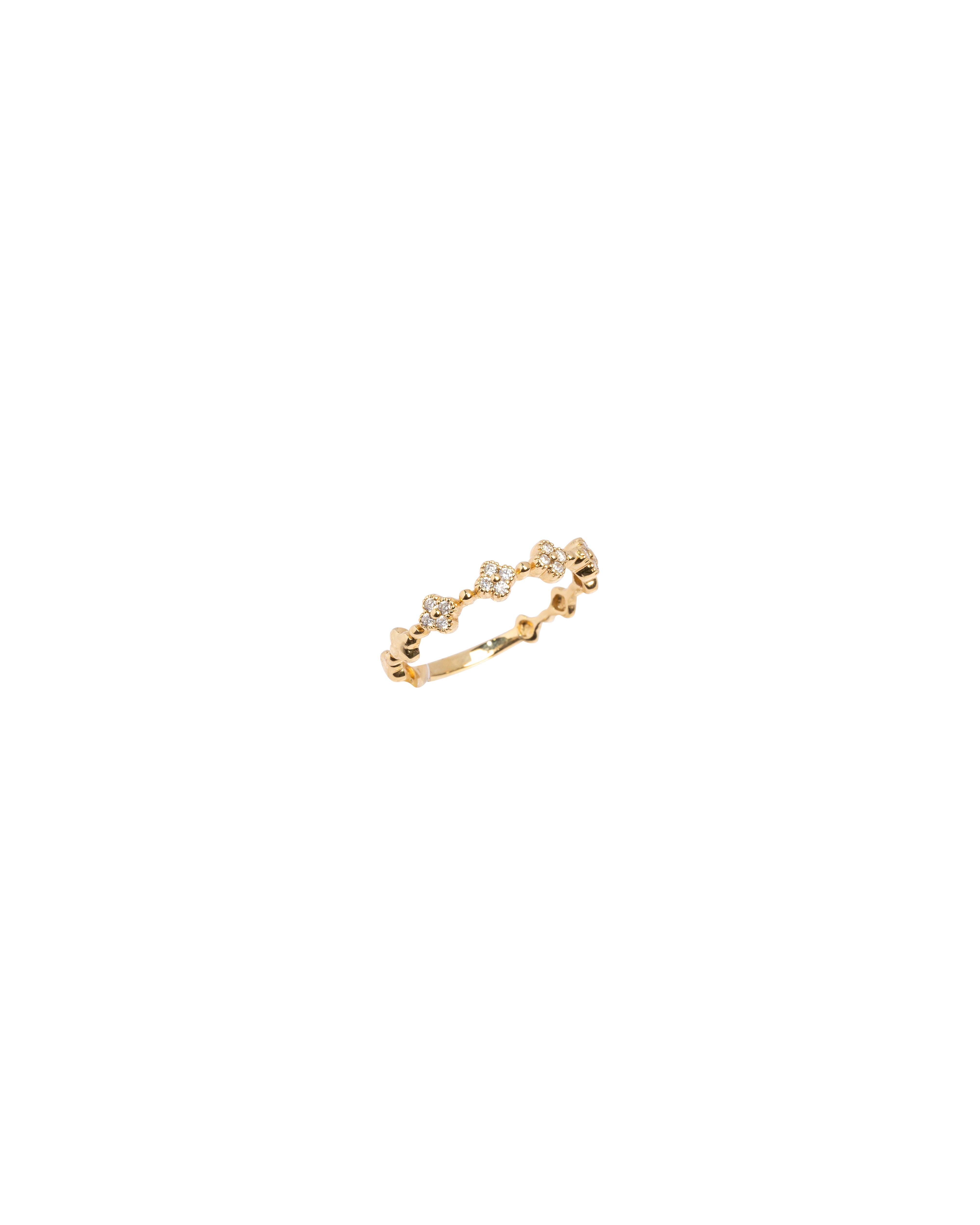 Gold ring with a unique design on a white background