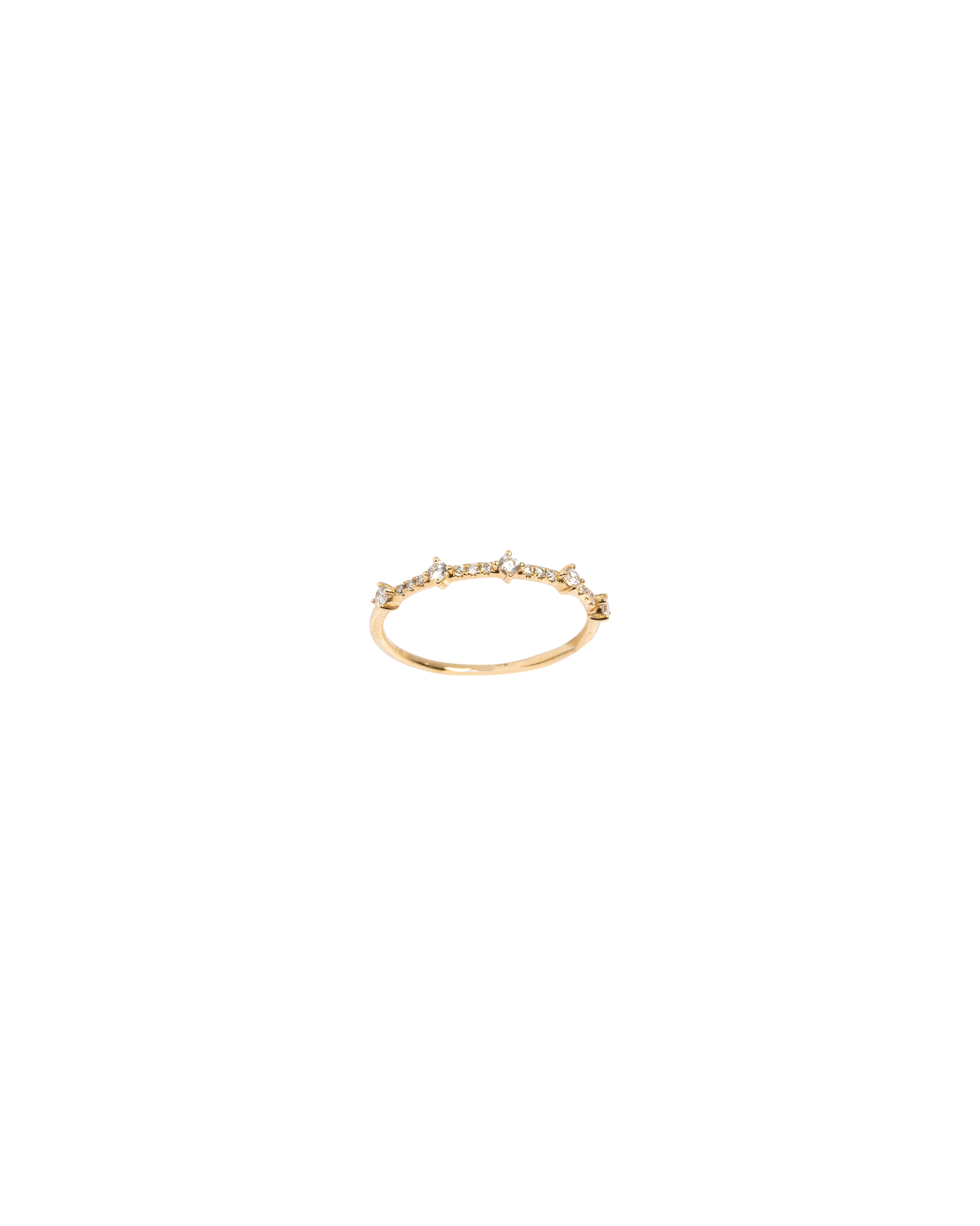 Gold ring with small stones on a white background