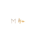 Pair of gold earrings with diamond accents on a white background