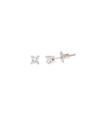 Pair of diamond stud earrings on a white background