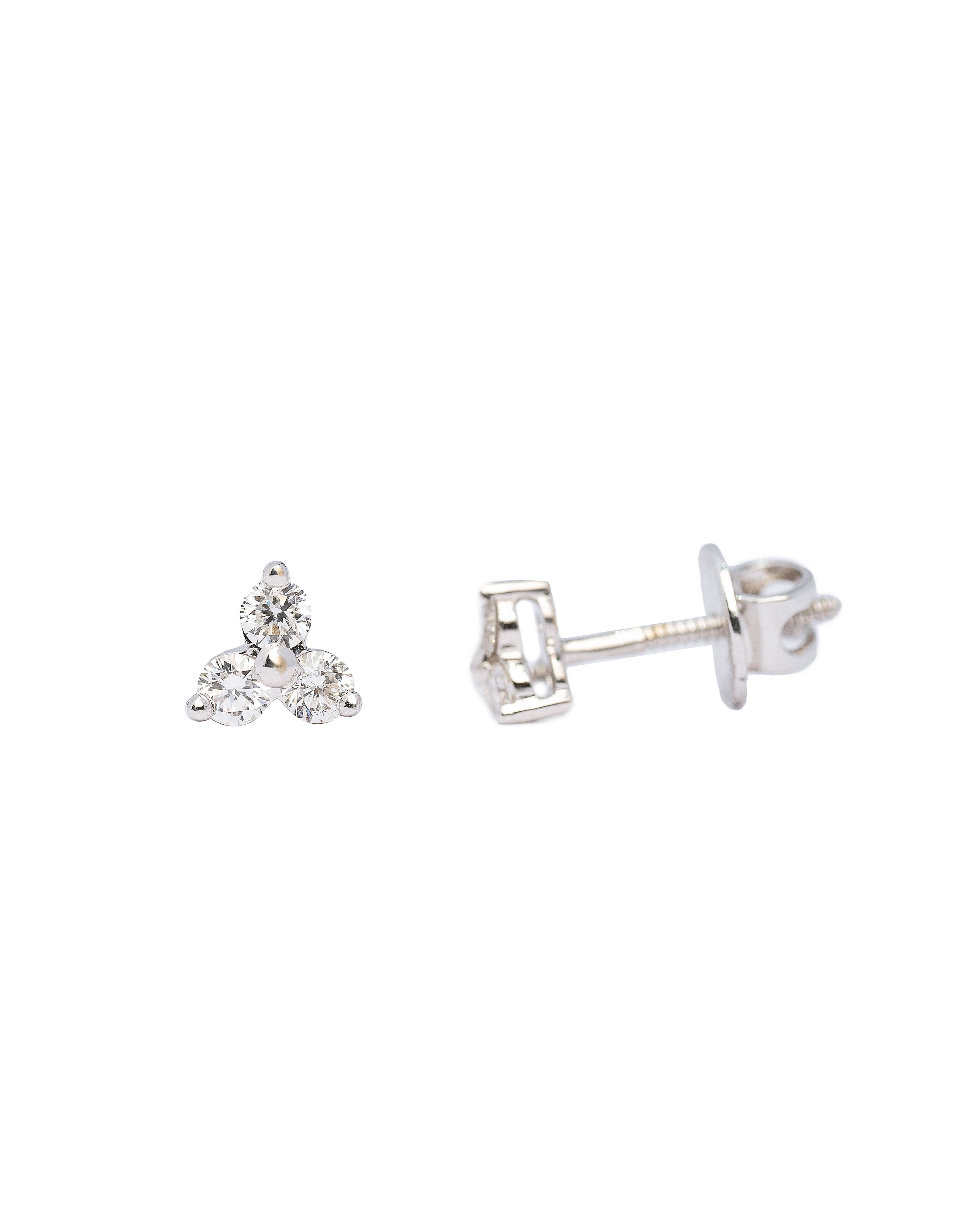 Pair of silver earrings with clear gemstones on a white background