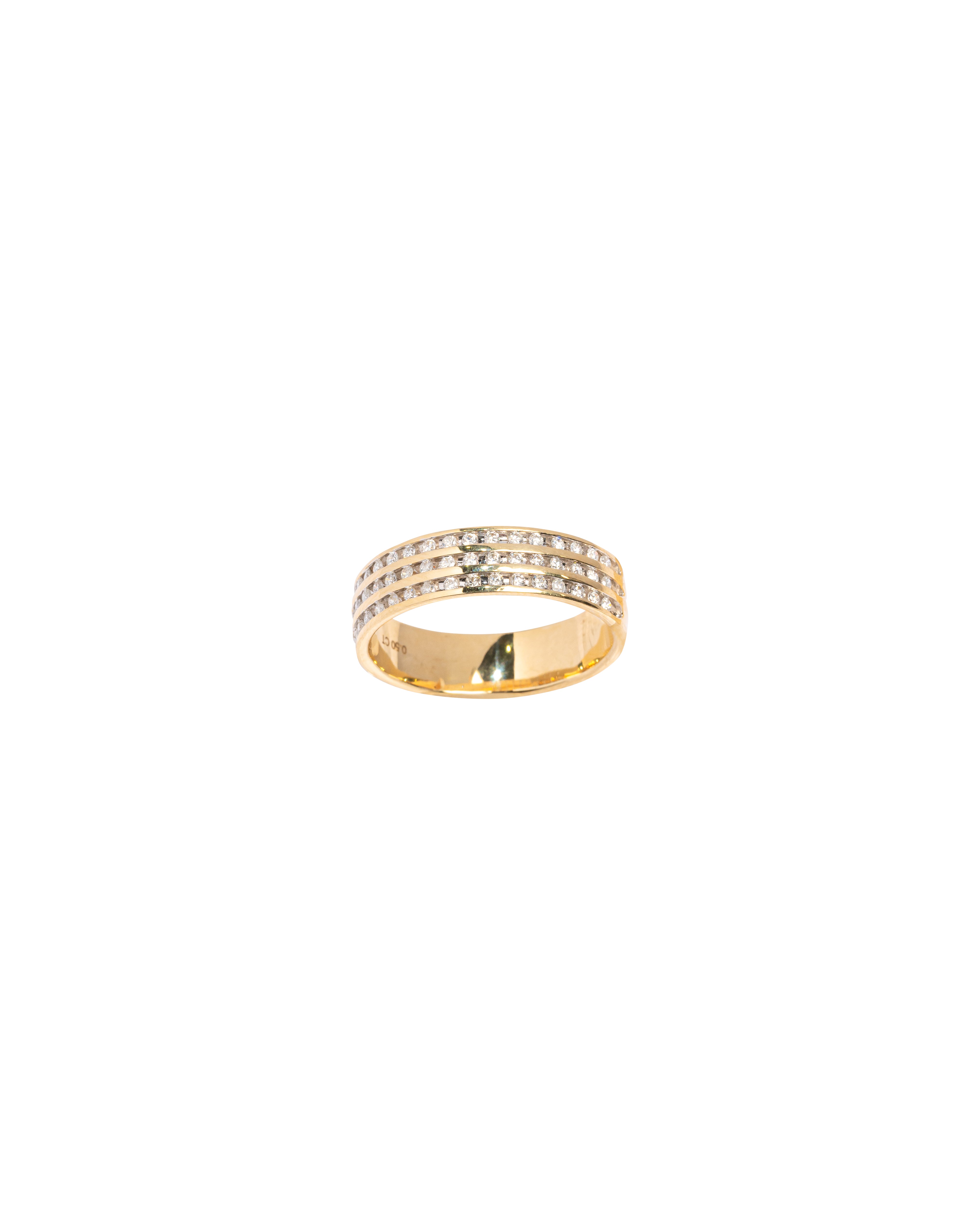 Gold ring with embedded stones on a white background