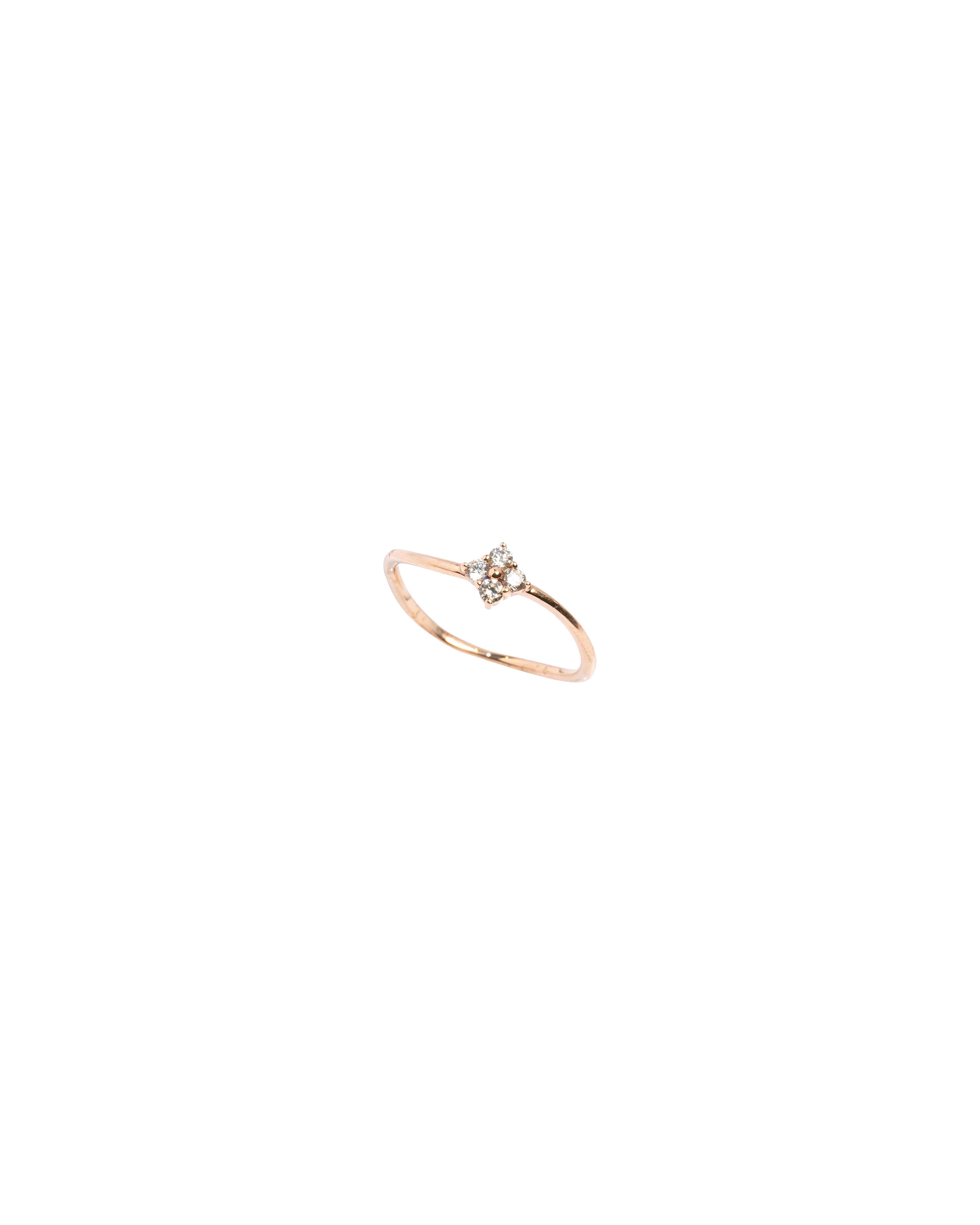 Rose gold ring with a small diamond on a white background