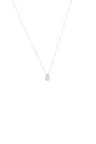 Silver necklace with a small round pendant on a white background