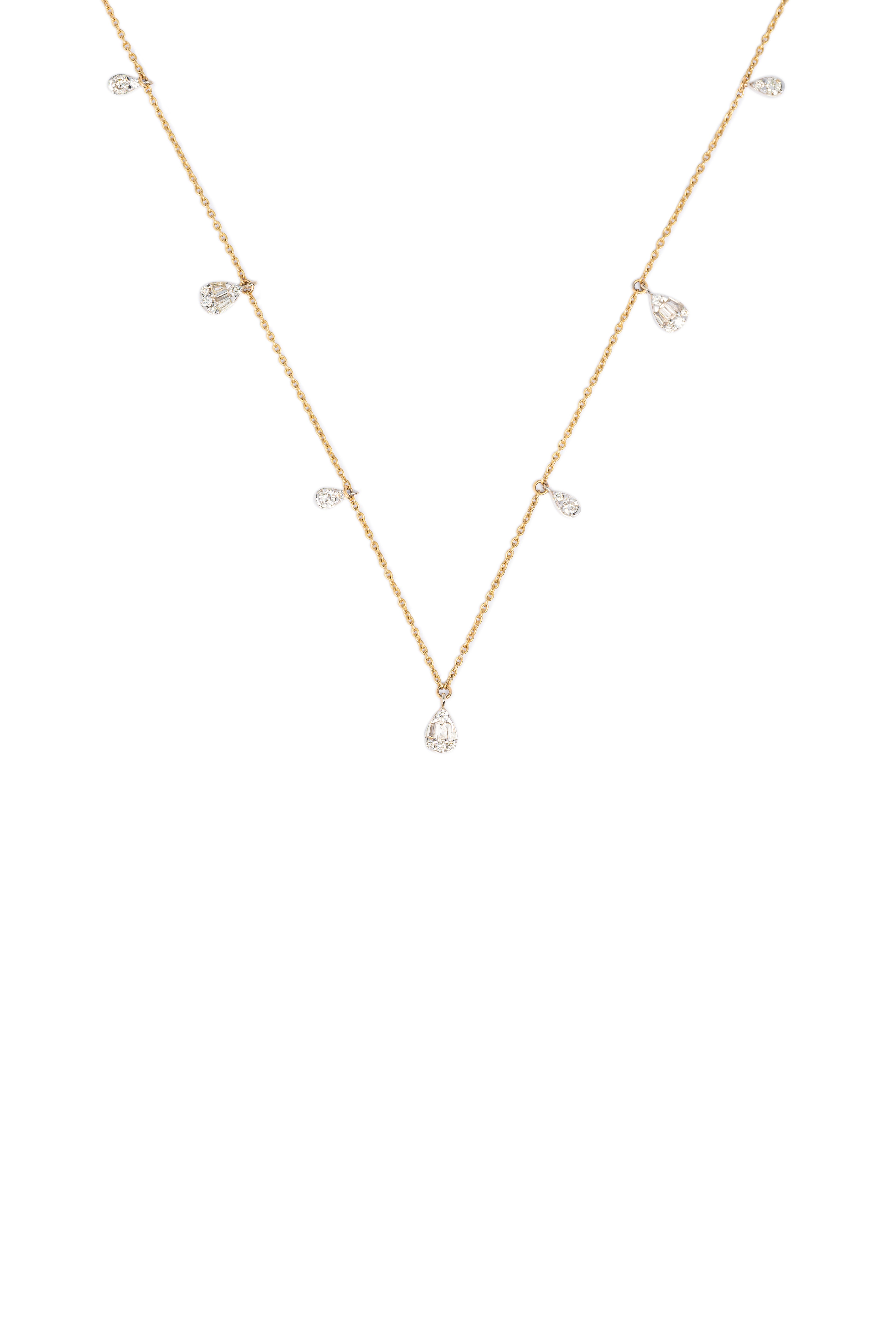 Gold necklace with small pearls on a white background