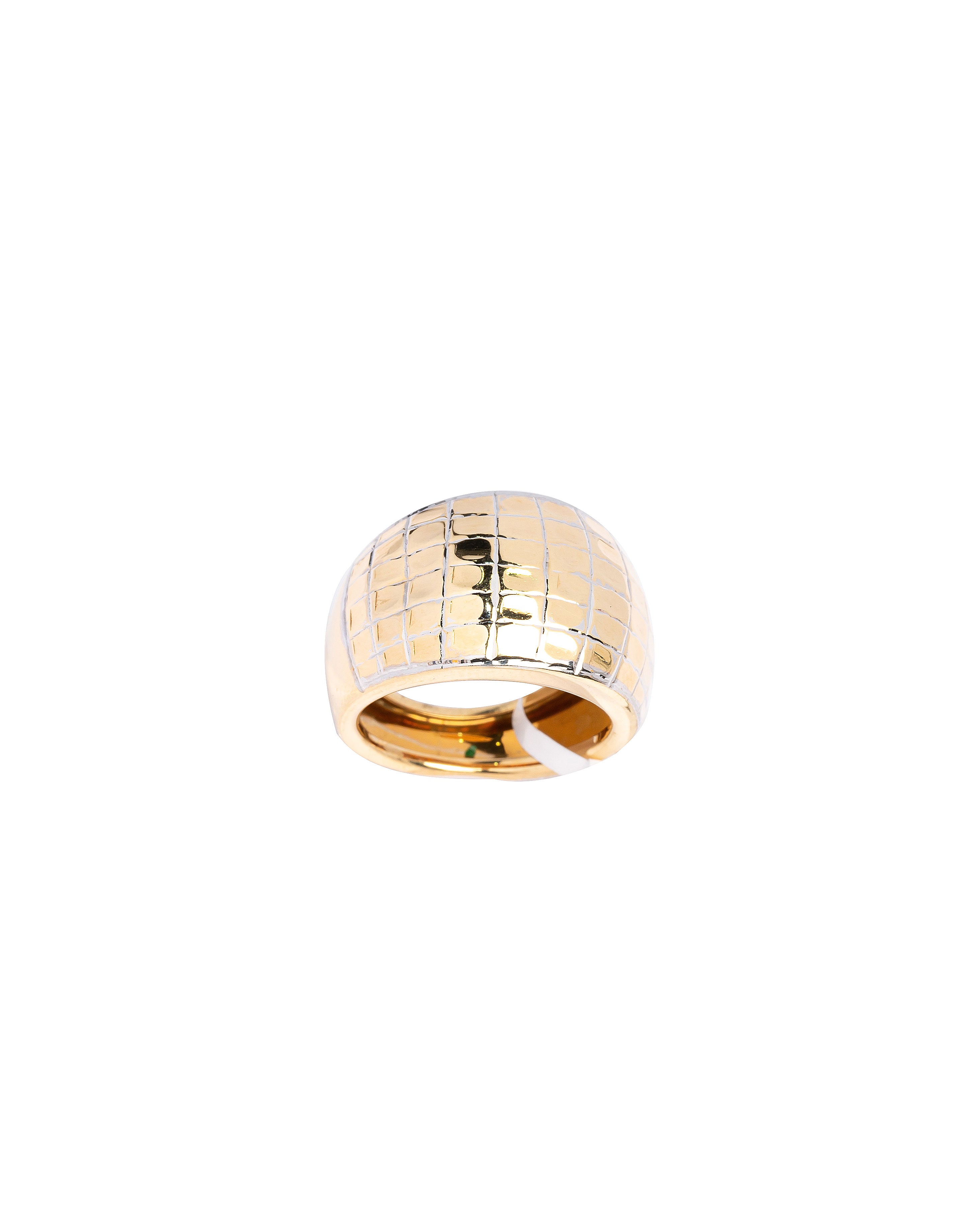 Gold ring with a textured pattern on a white background