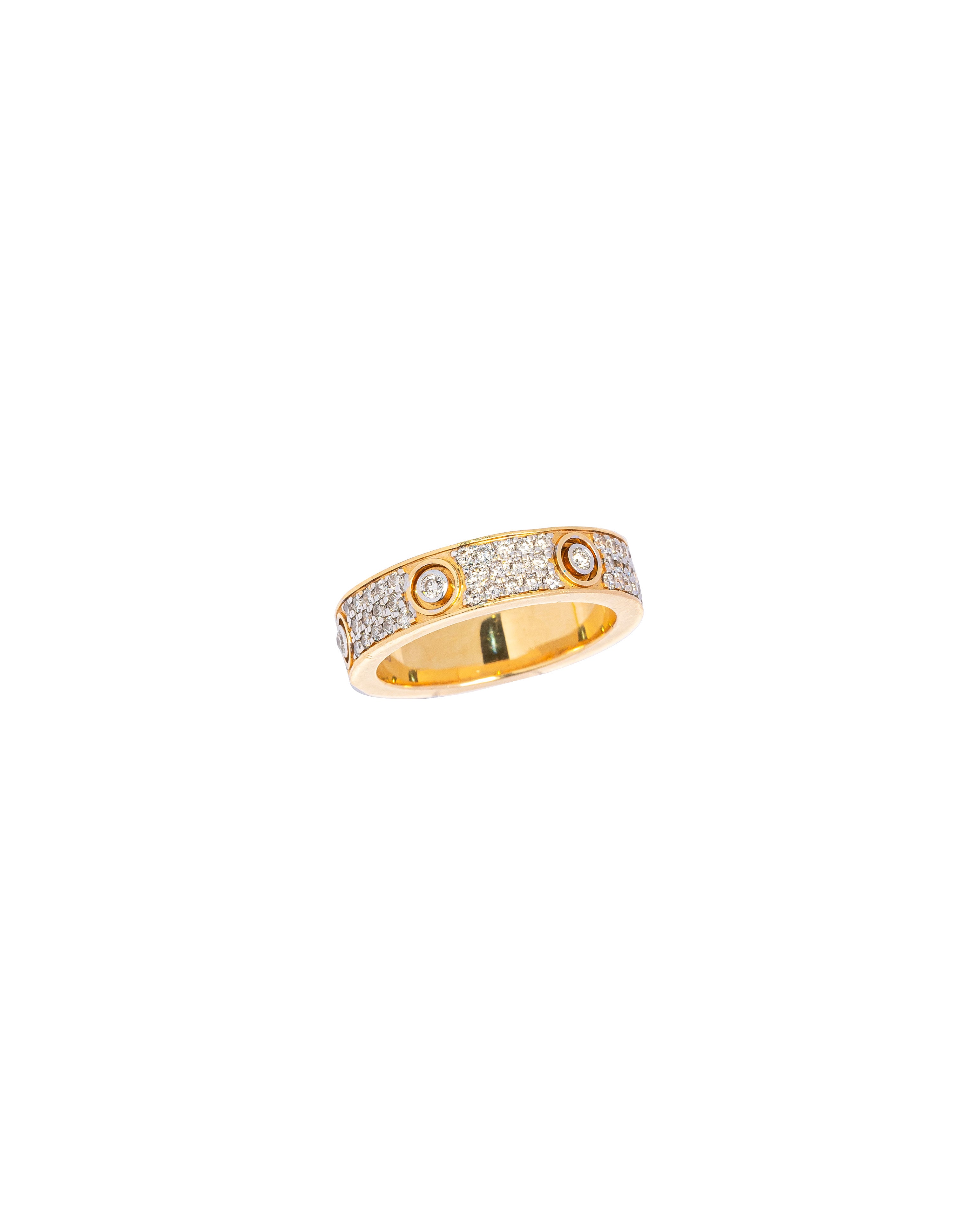 Gold ring with embedded diamonds on a white background