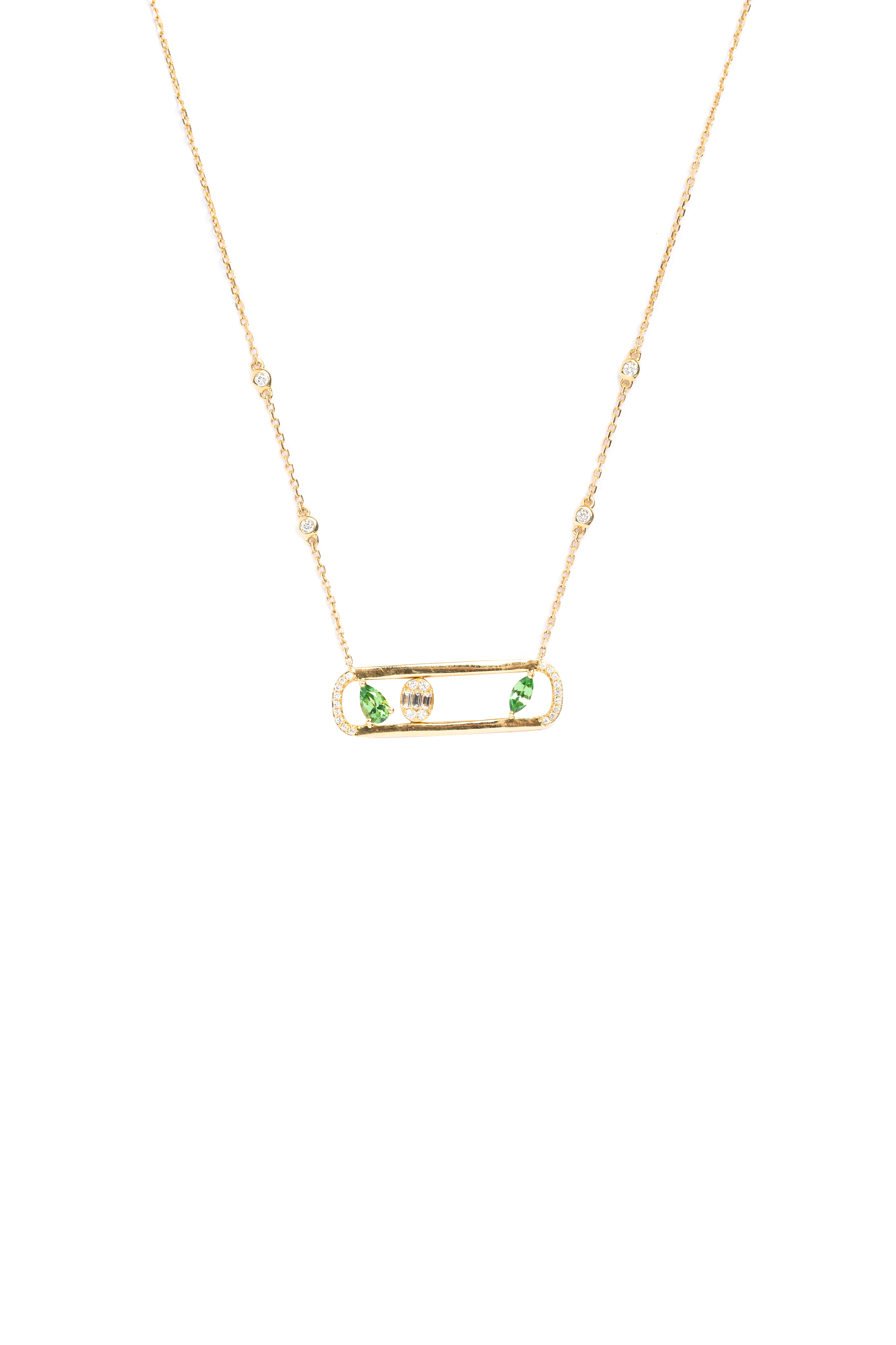 Gold necklace with a rectangular pendant on a white background