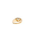 Gold ring with a small diamond on a white background