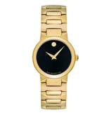 Gold wristwatch with black face on a white background