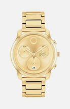 Gold watch with a detailed face on a white background