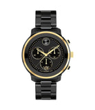 Black and gold watch with detailed face on a white background