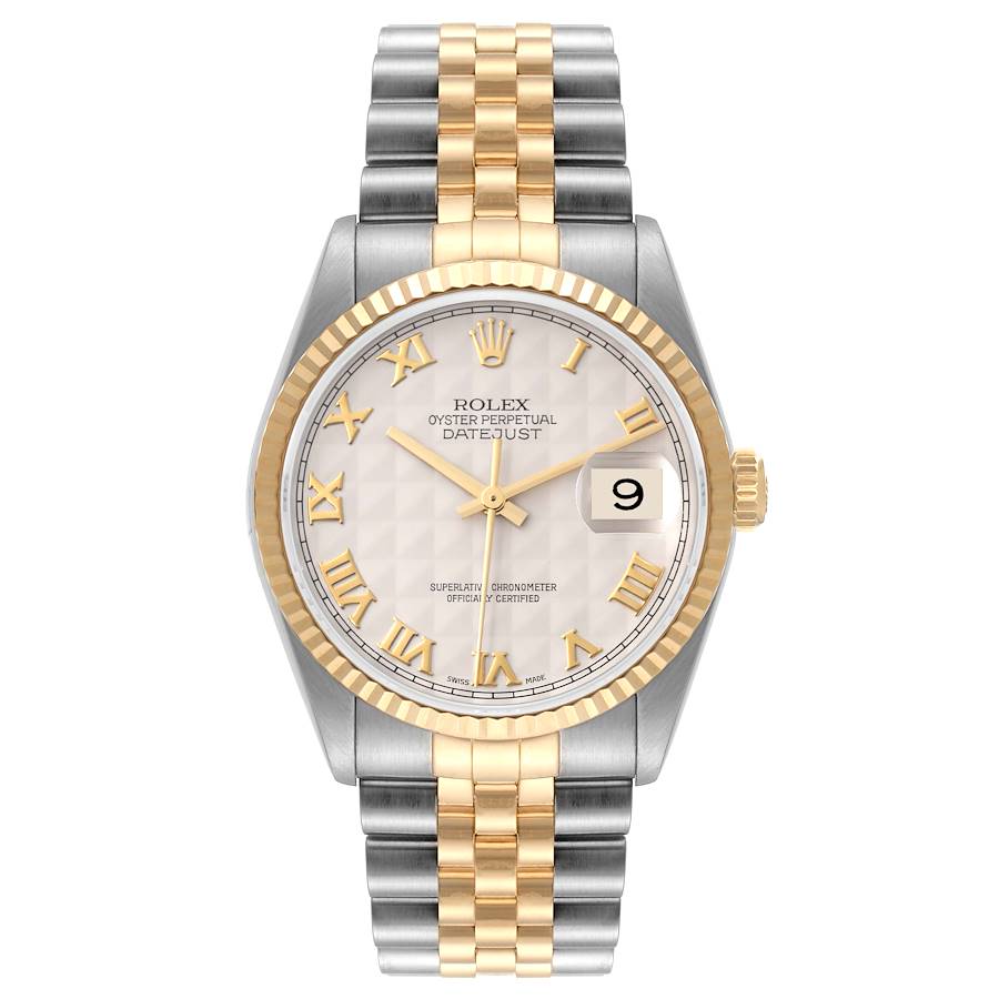 Two-tone watch with silver and gold band on a white background
